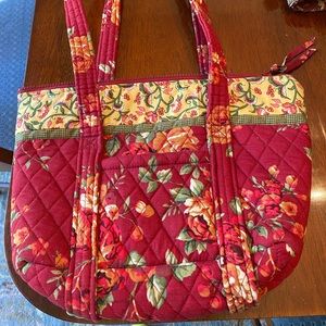 Red with gold Fabric pocketbook aka bag. Looks like a Vera Bradley but is not.